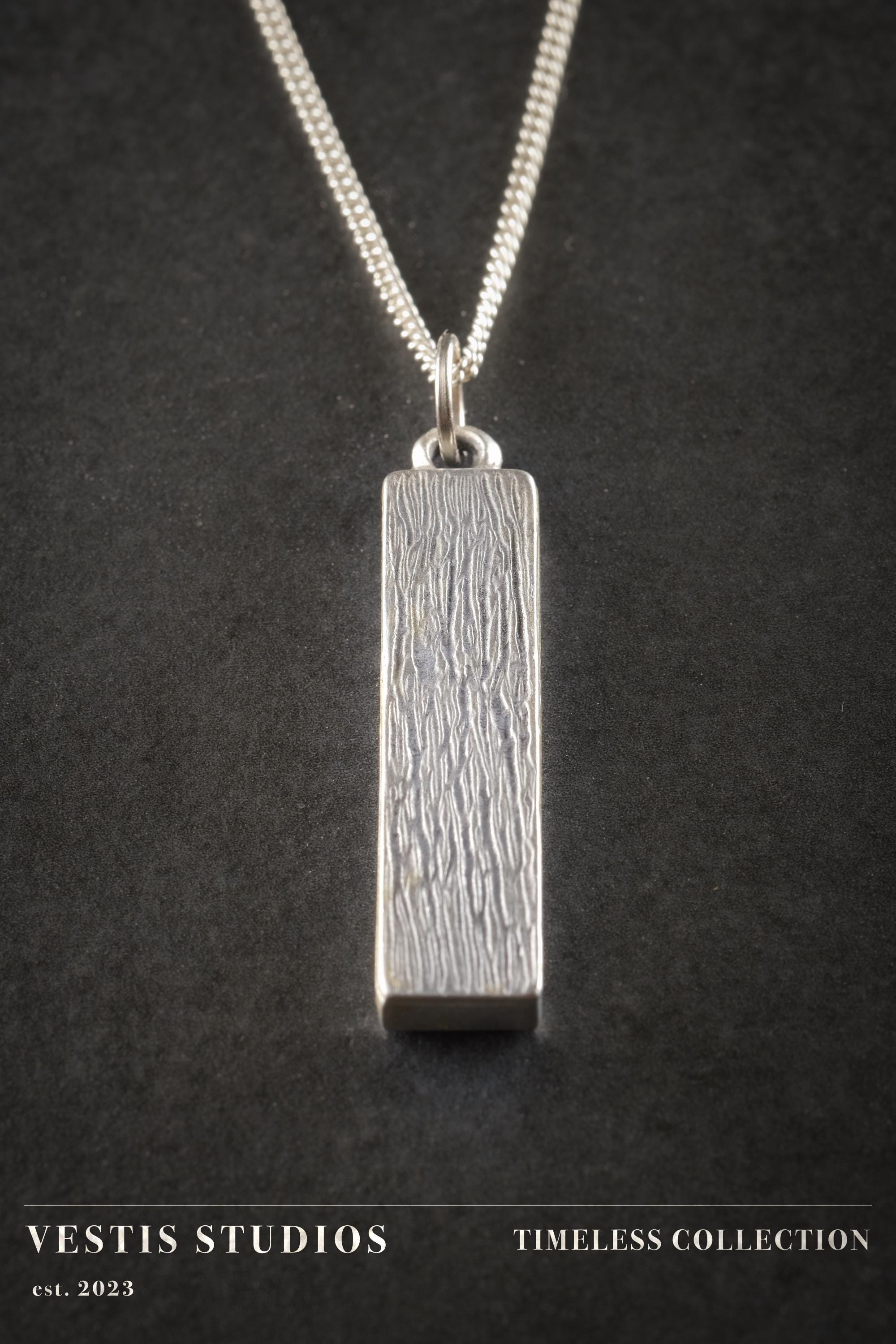 Spinosaurus Tooth Necklace – Plated Silver