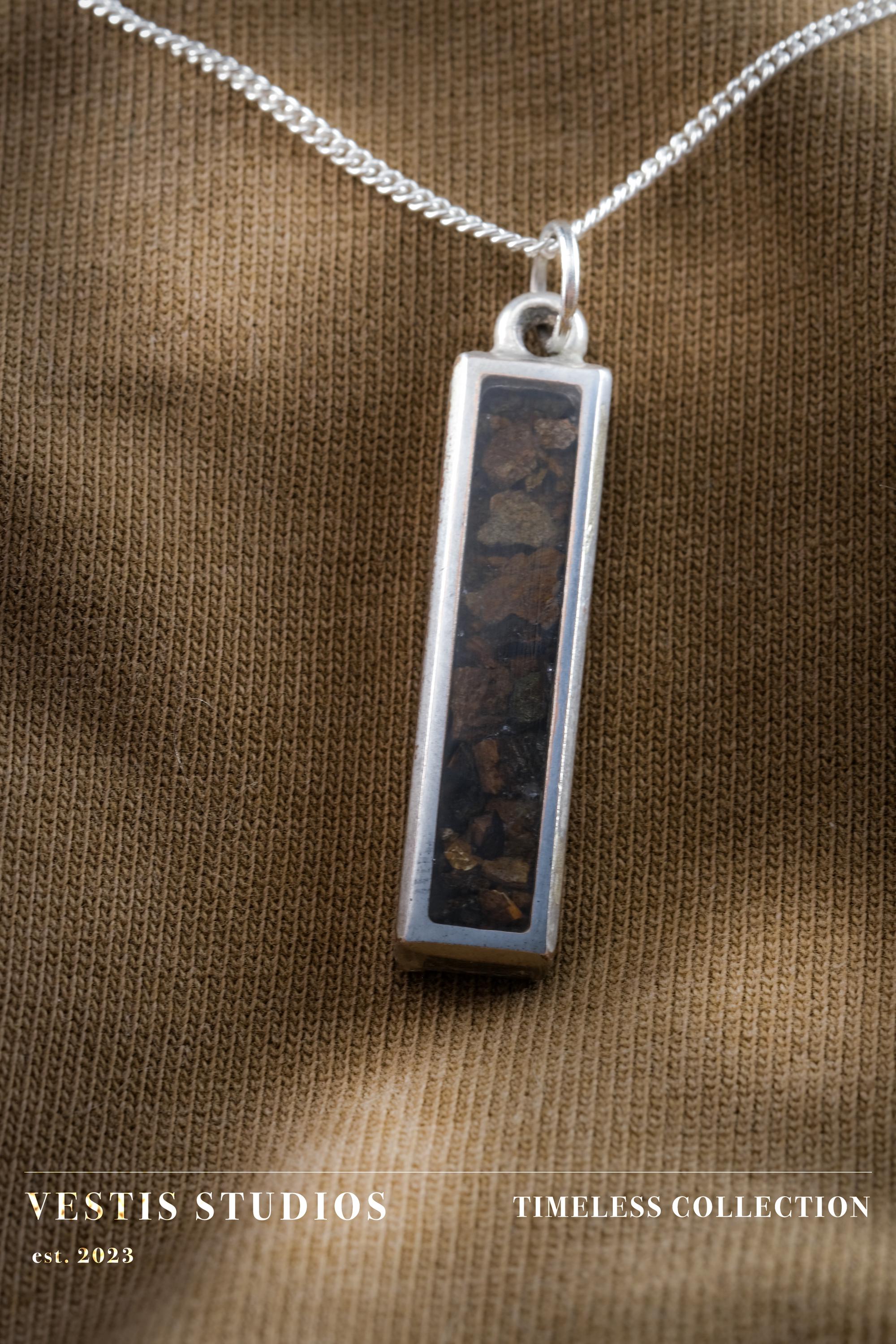 Raptor Fossil Necklace – Plated Silver