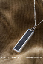 Diplodocus Fossil Necklace – Plated Silver