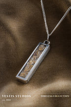 Spinosaurus Tooth Necklace – Plated Silver