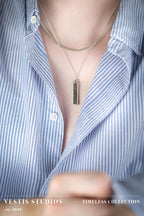 Raptor Fossil Necklace – Plated Silver