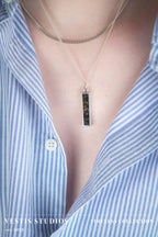 Diplodocus & Meteorite Fossil Necklace – Plated Silver