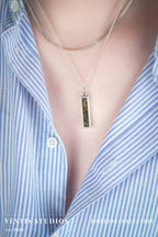 Raptor Fossil Necklace – Plated Silver