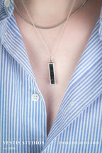 Diplodocus Fossil Necklace – Plated Silver